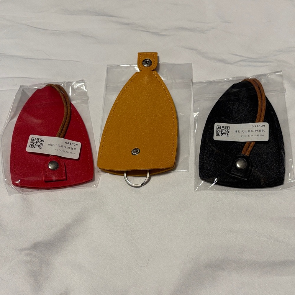 NWT  Set of Three  Key Holders in Red, Yellow, and Black
